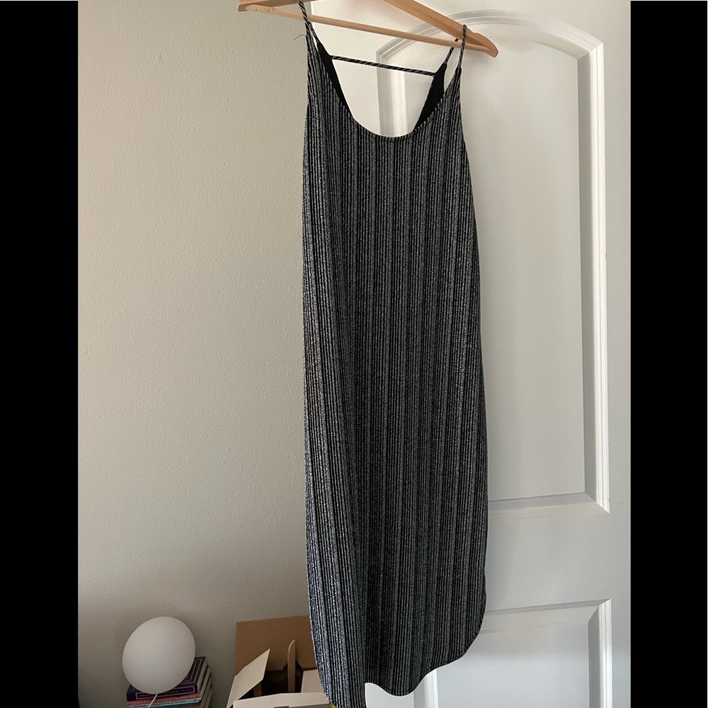 Need Supply dress by Stelen. Only worn a few times. In great condition.